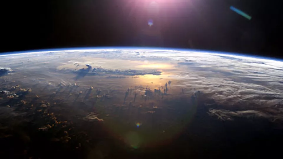 Sun over earth, photo: NASA, CC license from Flickr